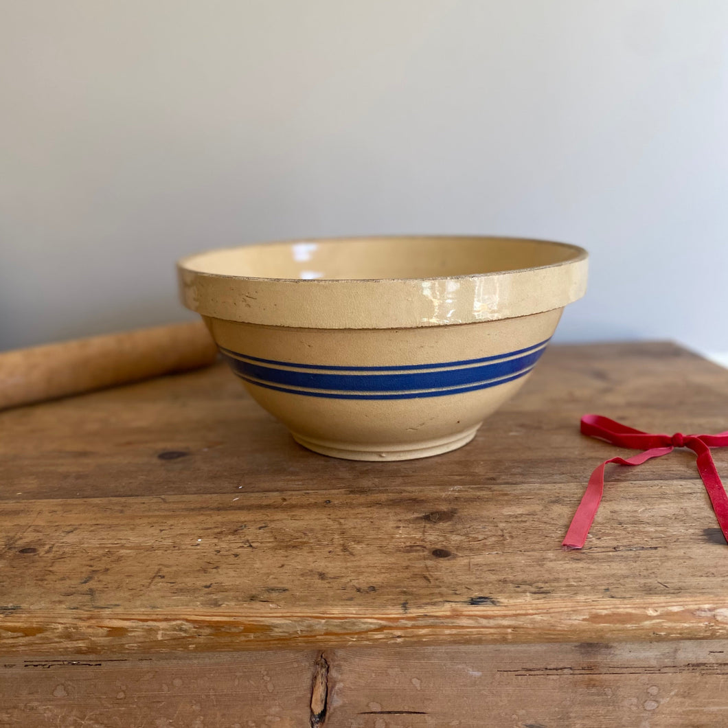 yellowware mixing bowl with blue stripe