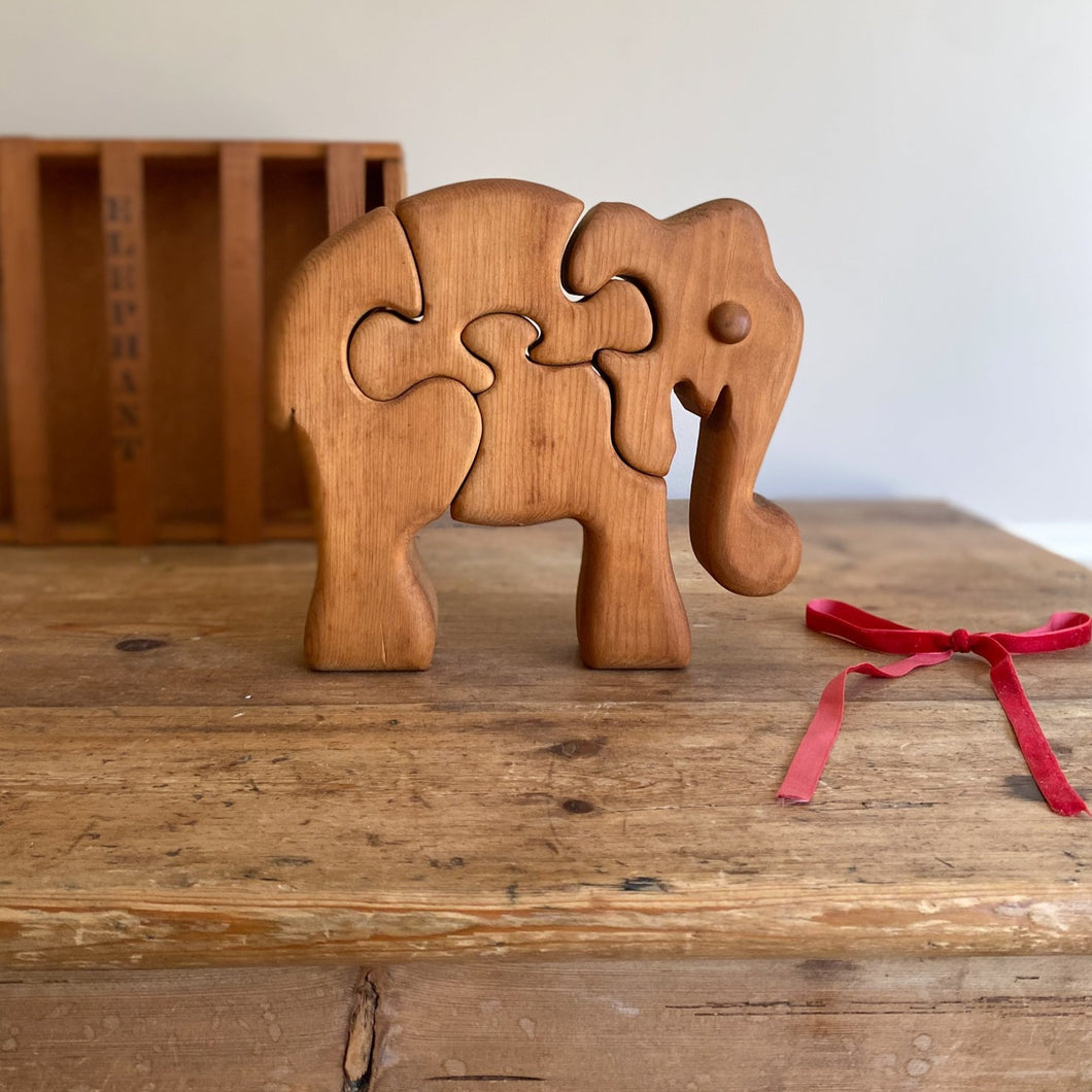 artisan-made wooden elephant puzzle