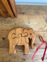 Load image into Gallery viewer, artisan-made wooden elephant puzzle
