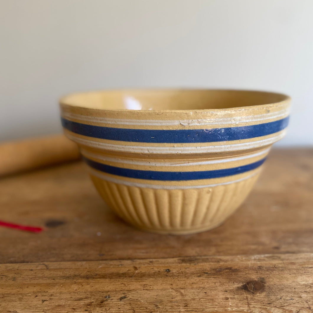 yellowware mixing bowl with scalloped detail