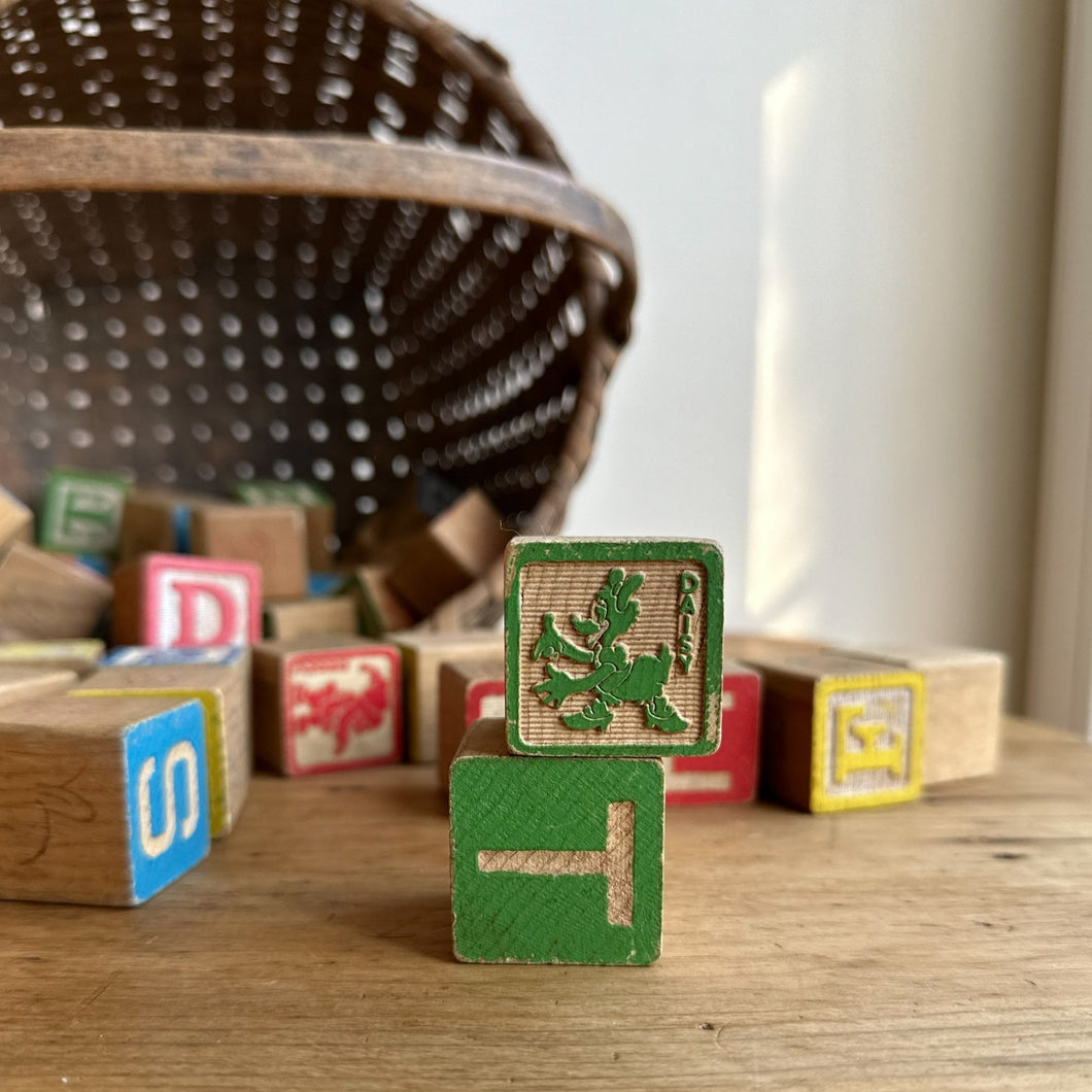 vintage disney blocks in an oak splint basket